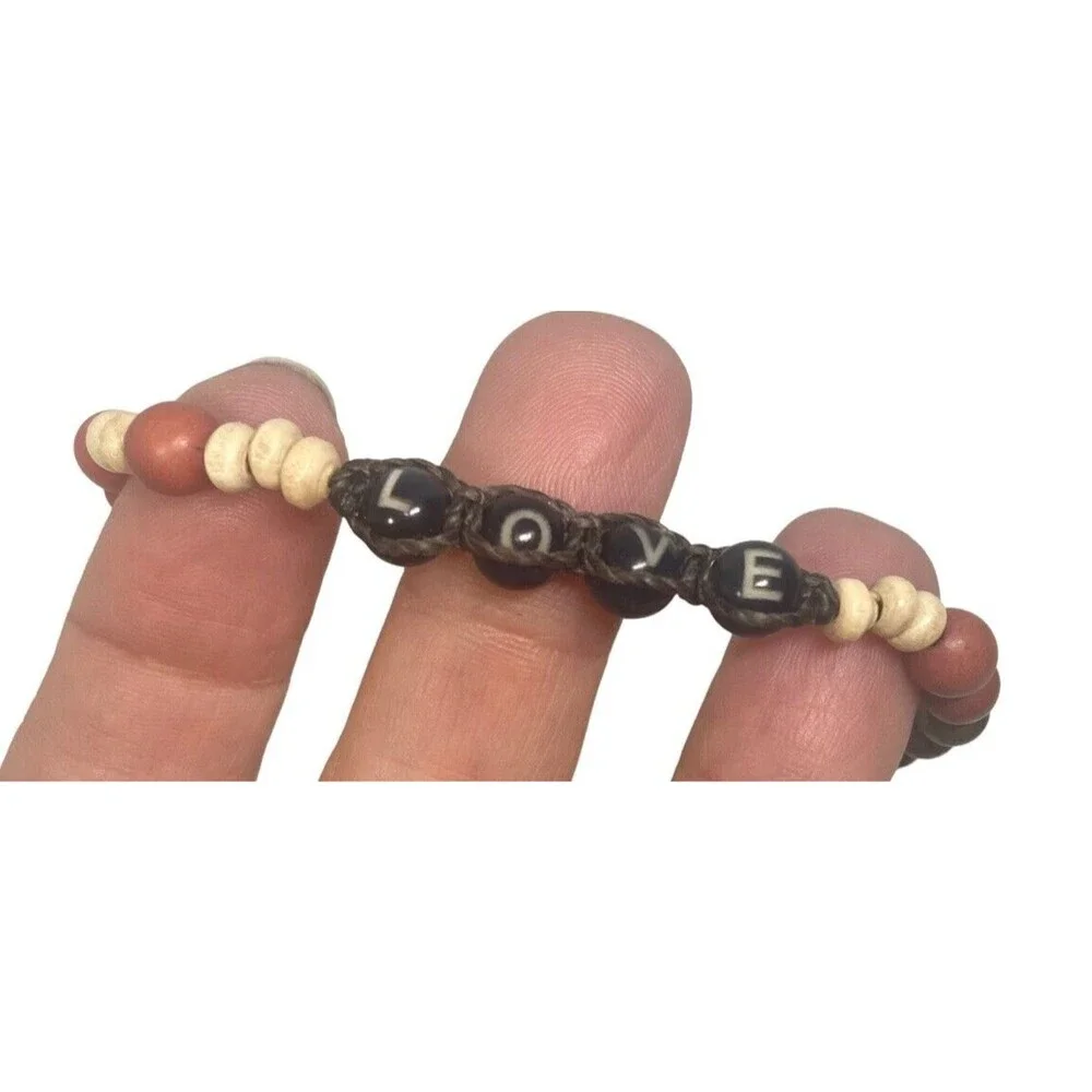 NWT Artisan bracelet Love is Project Handmade Beaded Boho adjustable nature